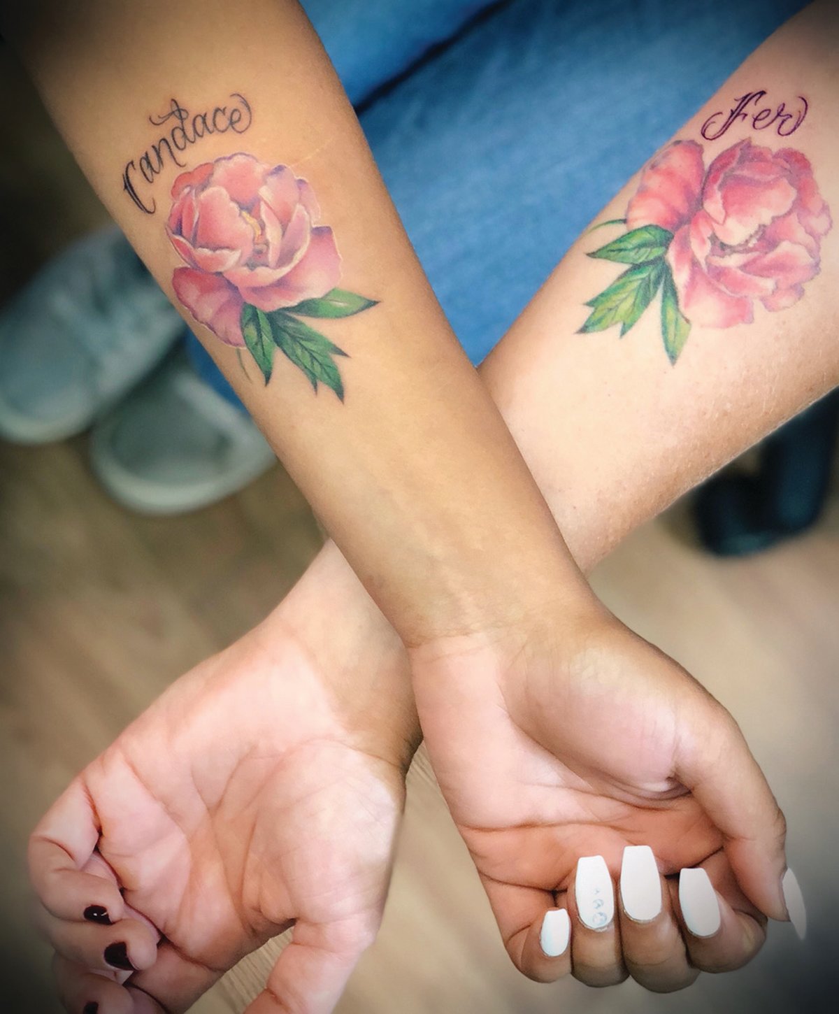 MATCHING MEMENTOS: Candace Johndrow and her newly adopted daughter, Fer, show off matching tattoos they received to commemorate their bond of family. Fer is a Venezuelan immigrant who found herself in Rhode Island’s foster care system. After being placed with Candace, two weeks before Christmas in 2016, the pair quickly decided to “adopt each other” and become a family.